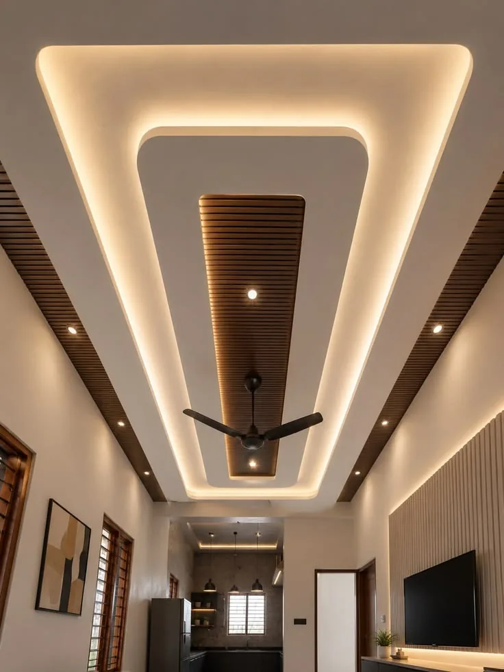 Plafon drop ceiling dengan cove lighting dan aksen kayu di Tangerang oleh ASATURA